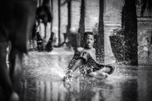 Cuba, Havanna, Cuba, Havanna, boy have fun in wet conditions Cuba, Havanna, Cuba, Havanna, boy have fun in wet conditions